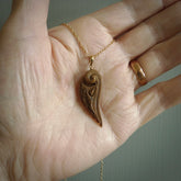 This is a hand carved lotus flower pendant. It is made from woolly mammoth tusk. This is a medium sized necklace and is a very unique, one only, pendant that is a collectors piece. Hand carved by New Zealand artist, Sami.